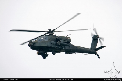 One of the pair of AH-64D Longbow Apache providing cover for the Chinook insertion