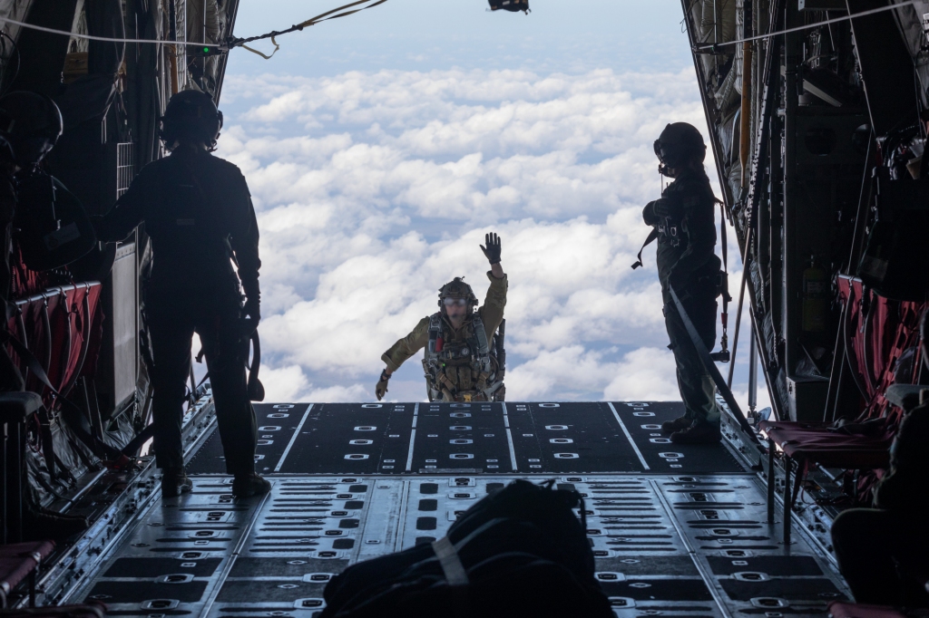 A Combat Controller from No. 4 Squadron jumps out of a from No. 37 Squadron C-130J Hercules.